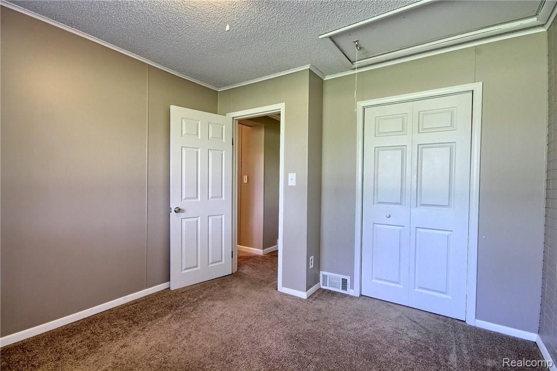 12725 Sweitzer Road Carleton, MI 48117 - Photo 17 of 26 2nd_Bedroom_2nd_View.jpg