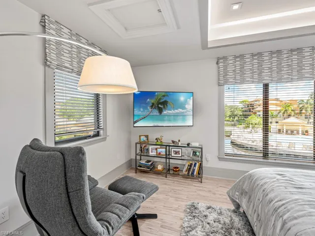 a bathroom with a shower sink and mirror