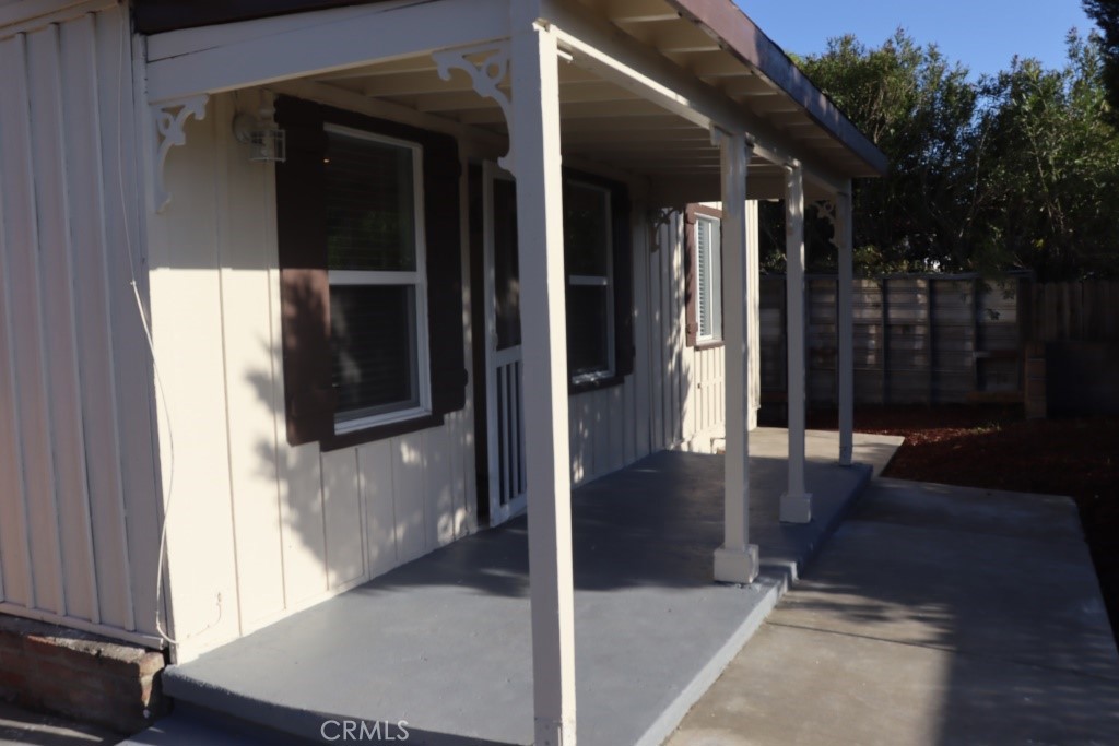 6865 Morro Road, Unit A Atascadero, CA 93422 - Photo 13 of 41 a view of a hallway with wooden floor and staircase