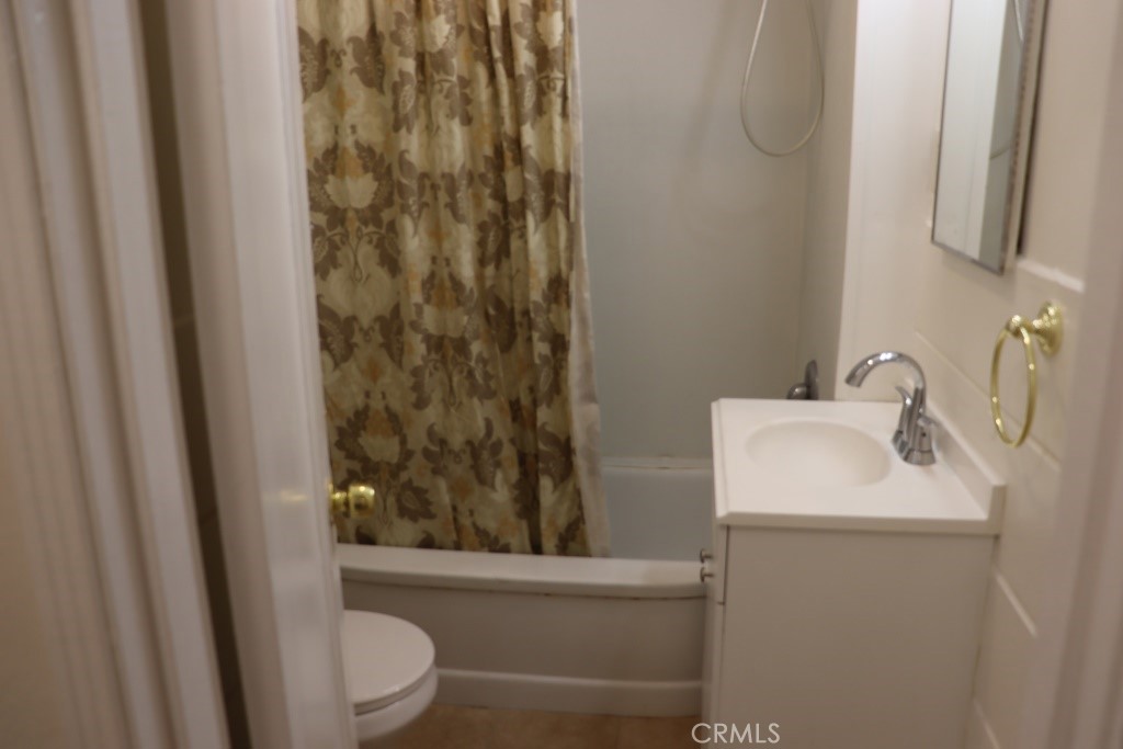 6865 Morro Road, Unit A Atascadero, CA 93422 - Photo 35 of 41 a bathroom with a sink toilet and shower