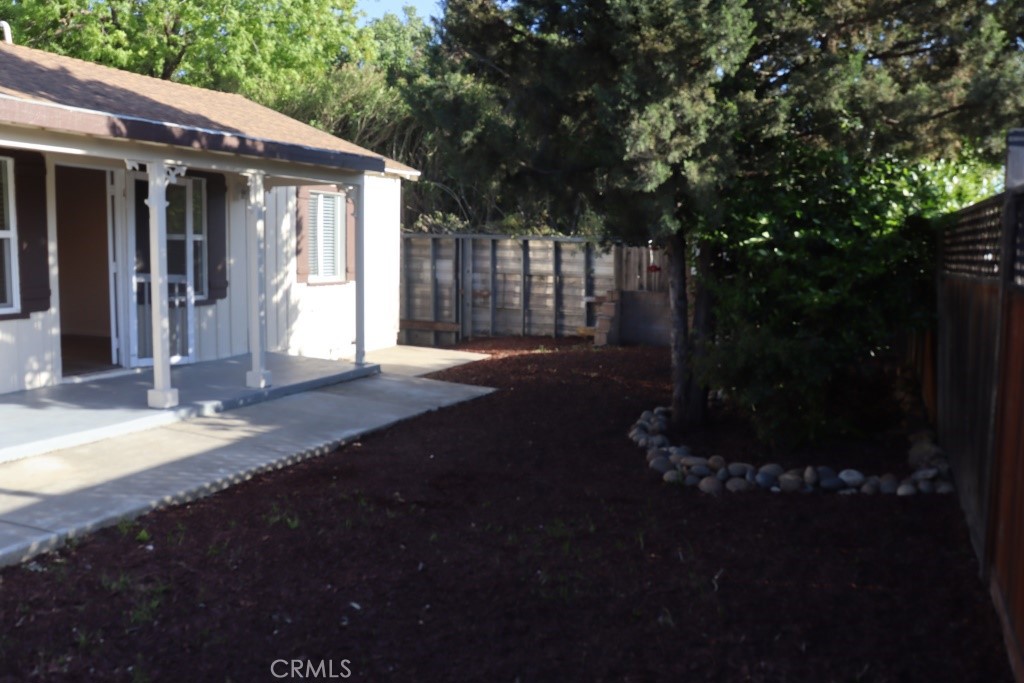 6865 Morro Road, Unit A Atascadero, CA 93422 - Photo 10 of 41 a front view of a house having yard