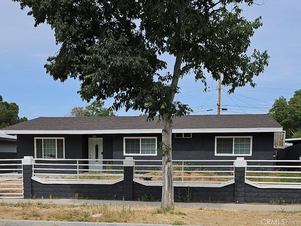 a front view of a house with balcony