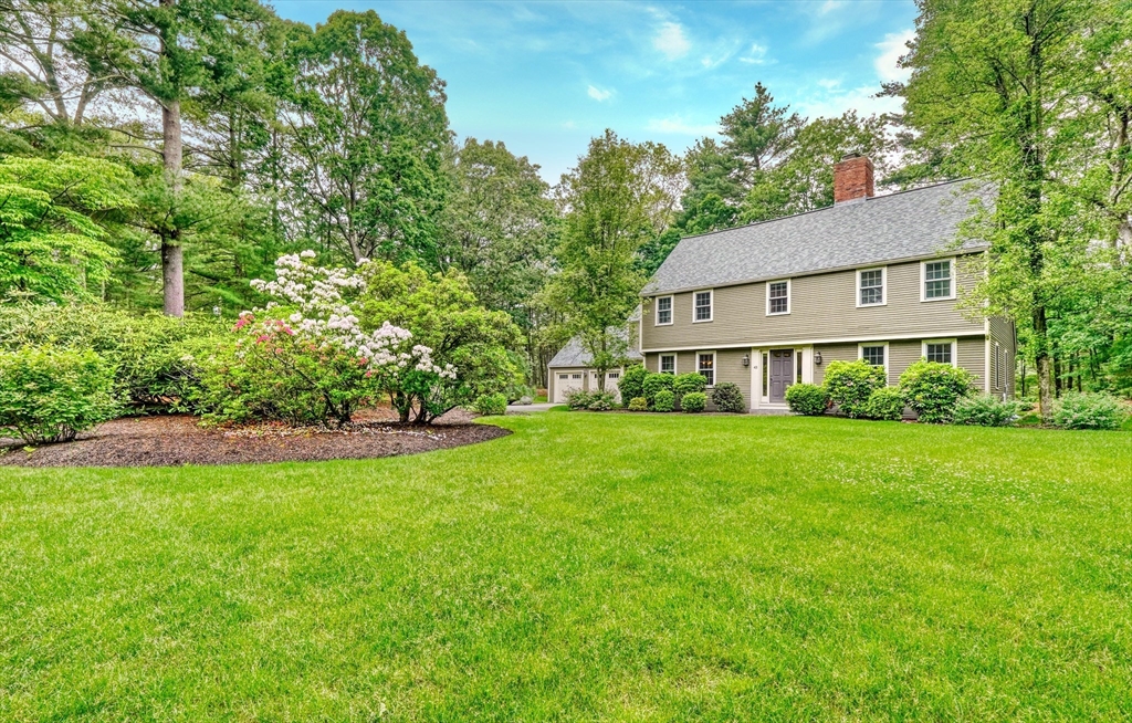 43 Old Pickard Road Concord, MA 01742 - Photo 1 of 27 a view of a house next to a big yard and large trees