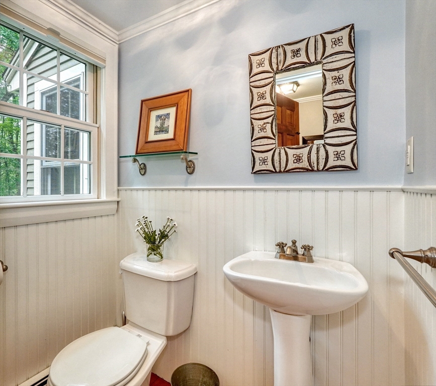 43 Old Pickard Road Concord, MA 01742 - Photo 13 of 27 a bathroom with a toilet sink and mirror