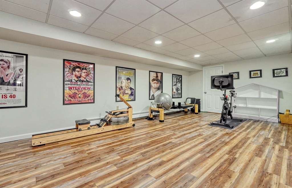 43 Old Pickard Road Concord, MA 01742 - Photo 15 of 27 a room with gym equipment and a view of living room