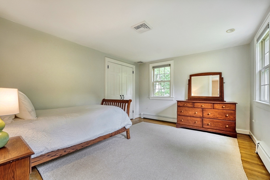 43 Old Pickard Road Concord, MA 01742 - Photo 19 of 27 a bed room with a bed and a window