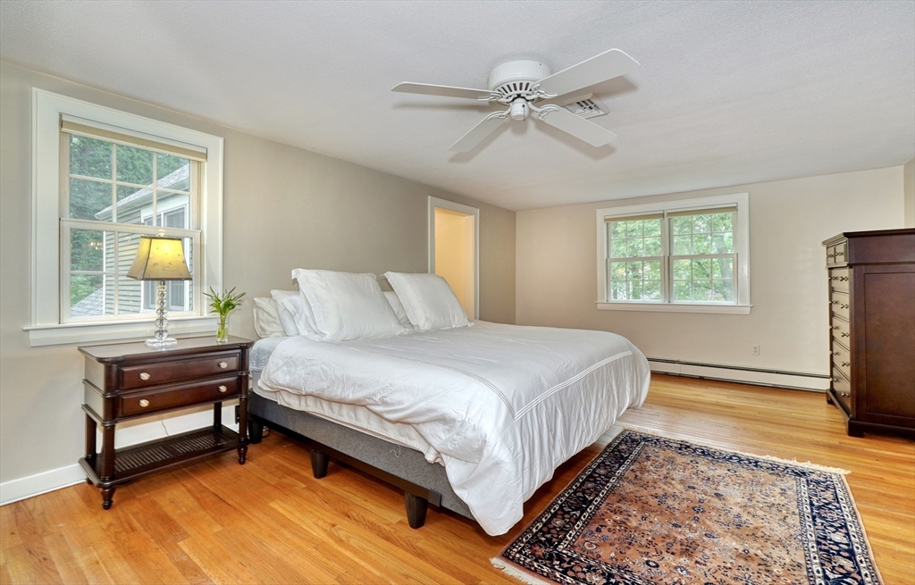 43 Old Pickard Road Concord, MA 01742 - Photo 22 of 27 a bedroom with a bed and a window