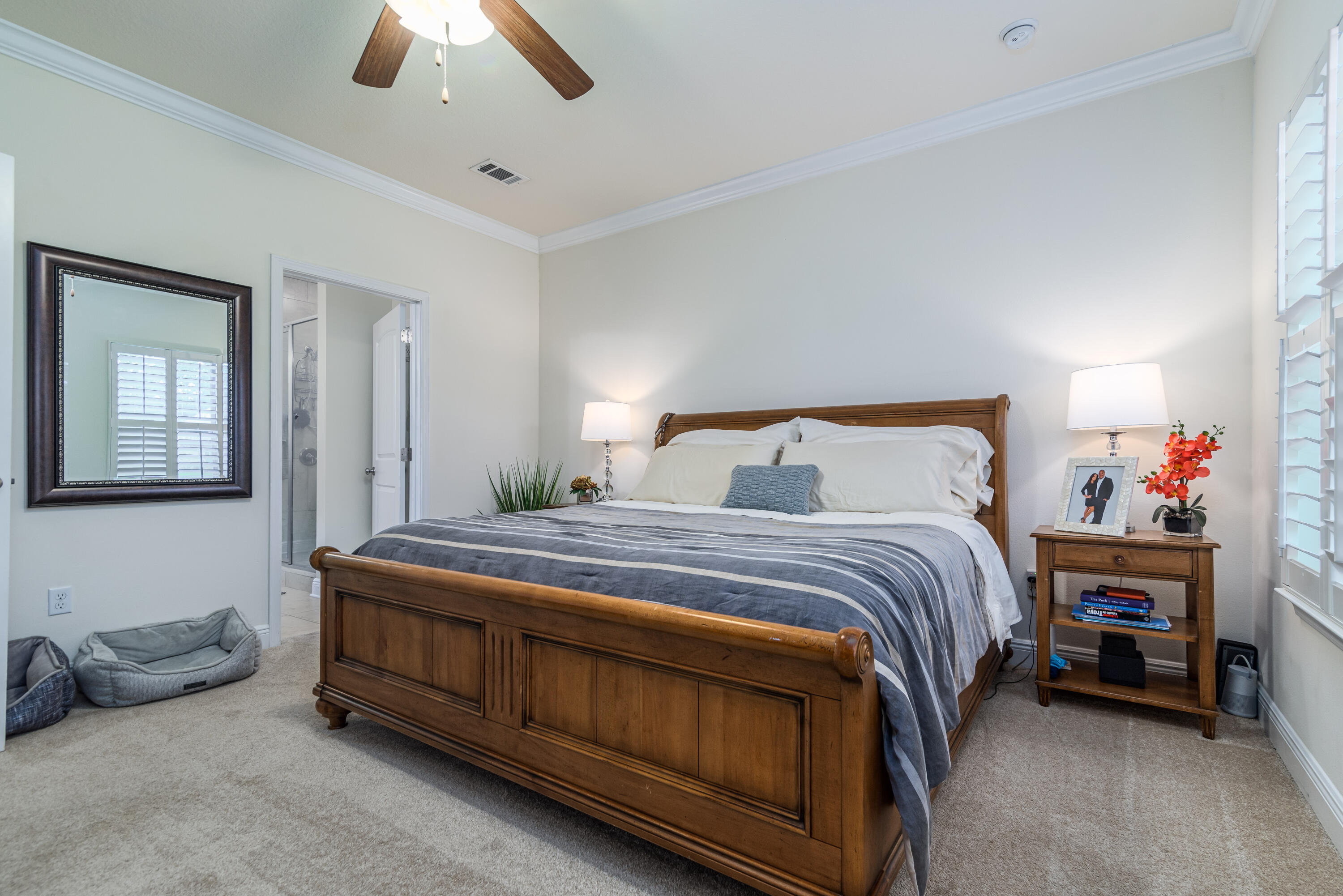 142 Pin Oak Loop Santa Rosa Beach, FL 32459 - Photo 18 of 56 a bedroom with a bed and a chandelier