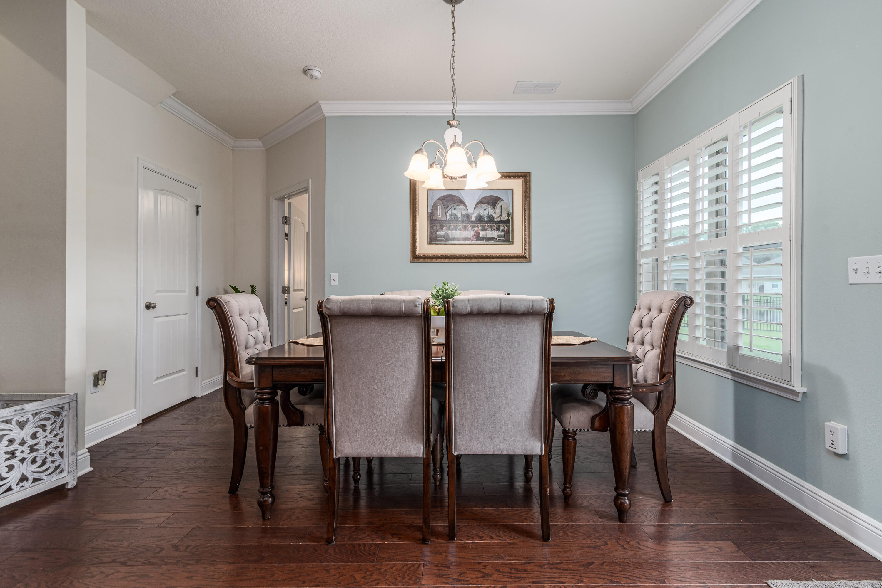 142 Pin Oak Loop Santa Rosa Beach, FL 32459 - Photo 25 of 56 a view of a dining room with furniture window and wooden floor