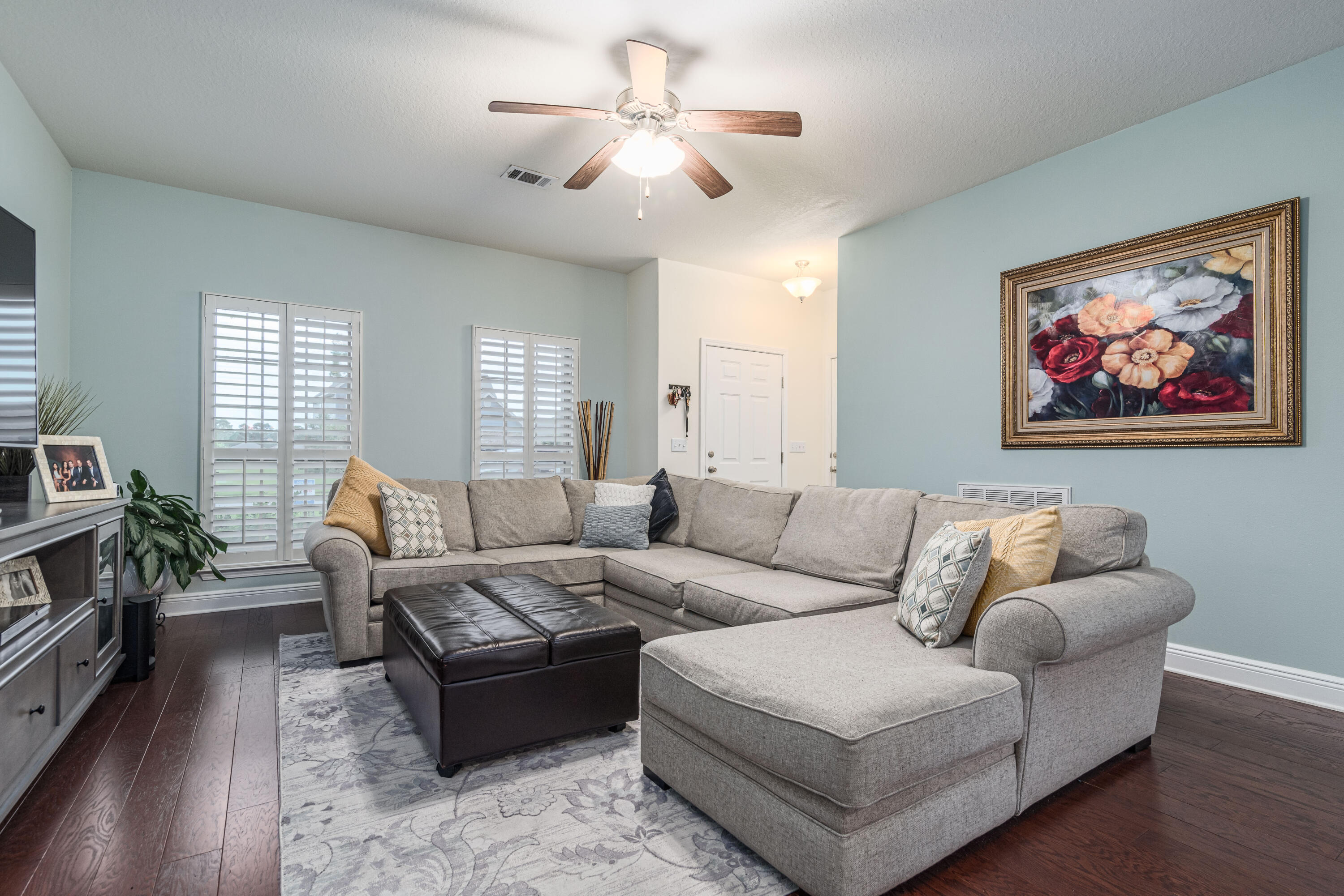 142 Pin Oak Loop Santa Rosa Beach, FL 32459 - Photo 37 of 56 a living room with furniture and a fireplace