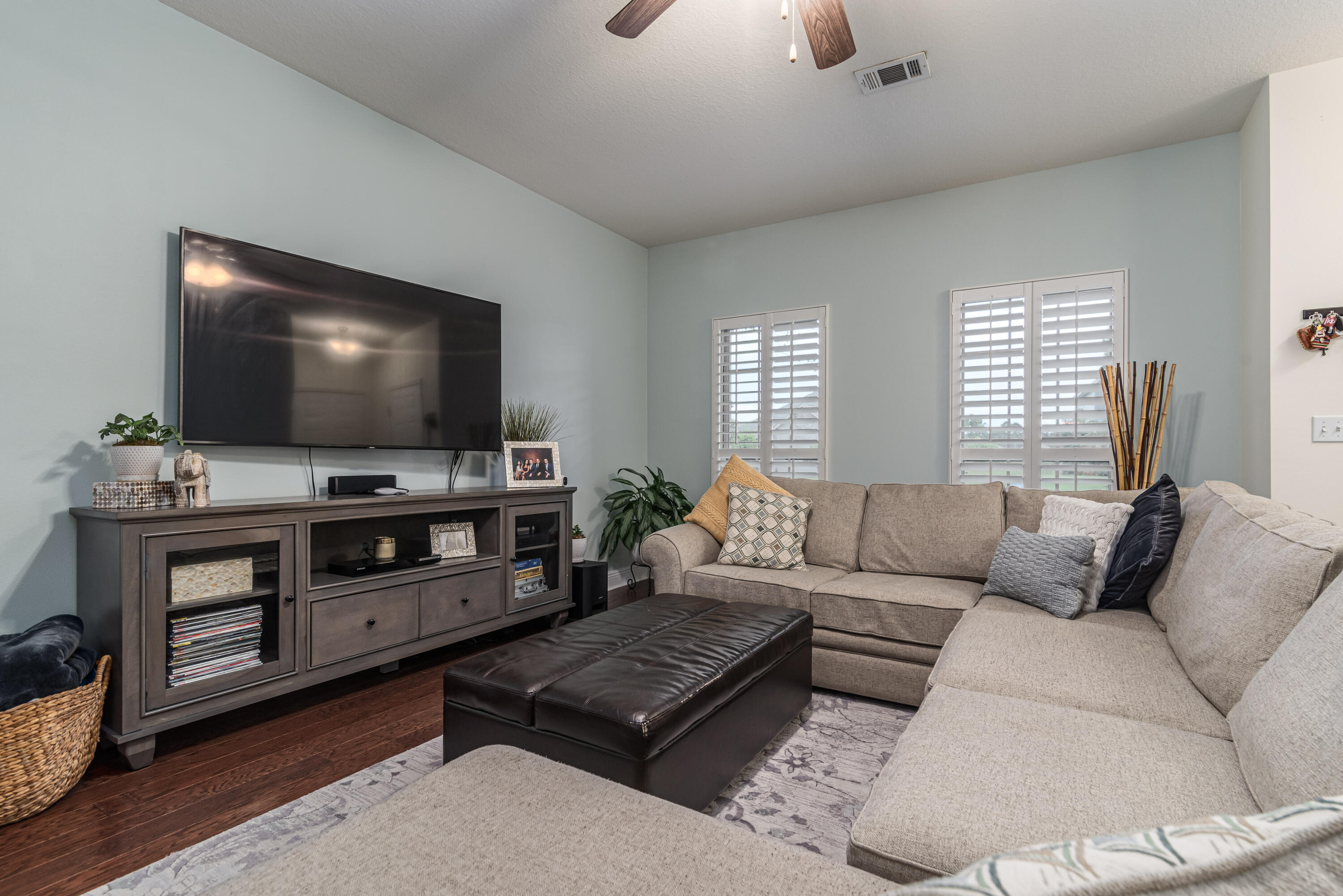 142 Pin Oak Loop Santa Rosa Beach, FL 32459 - Photo 38 of 56 a living room with furniture and a flat screen tv