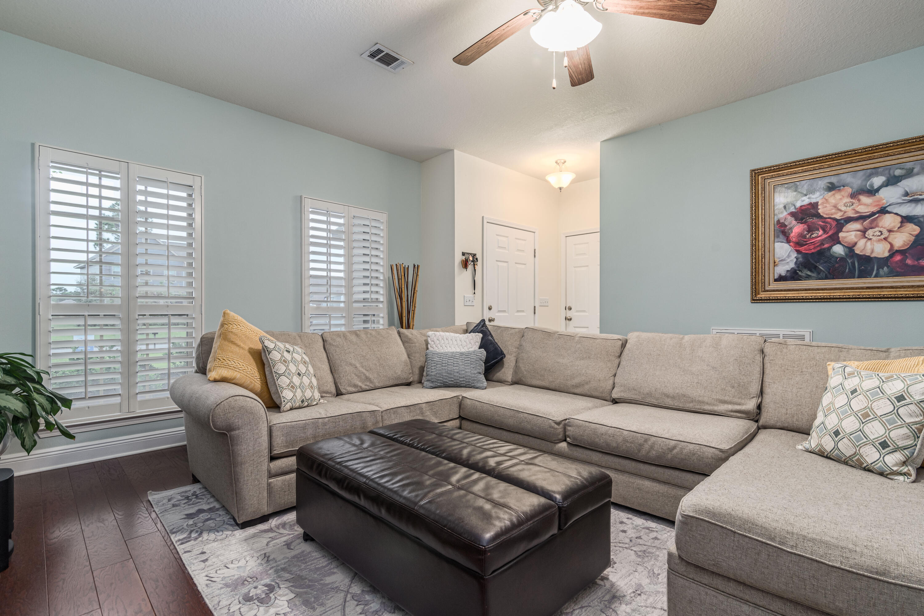 142 Pin Oak Loop Santa Rosa Beach, FL 32459 - Photo 39 of 56 a living room with furniture and a large window
