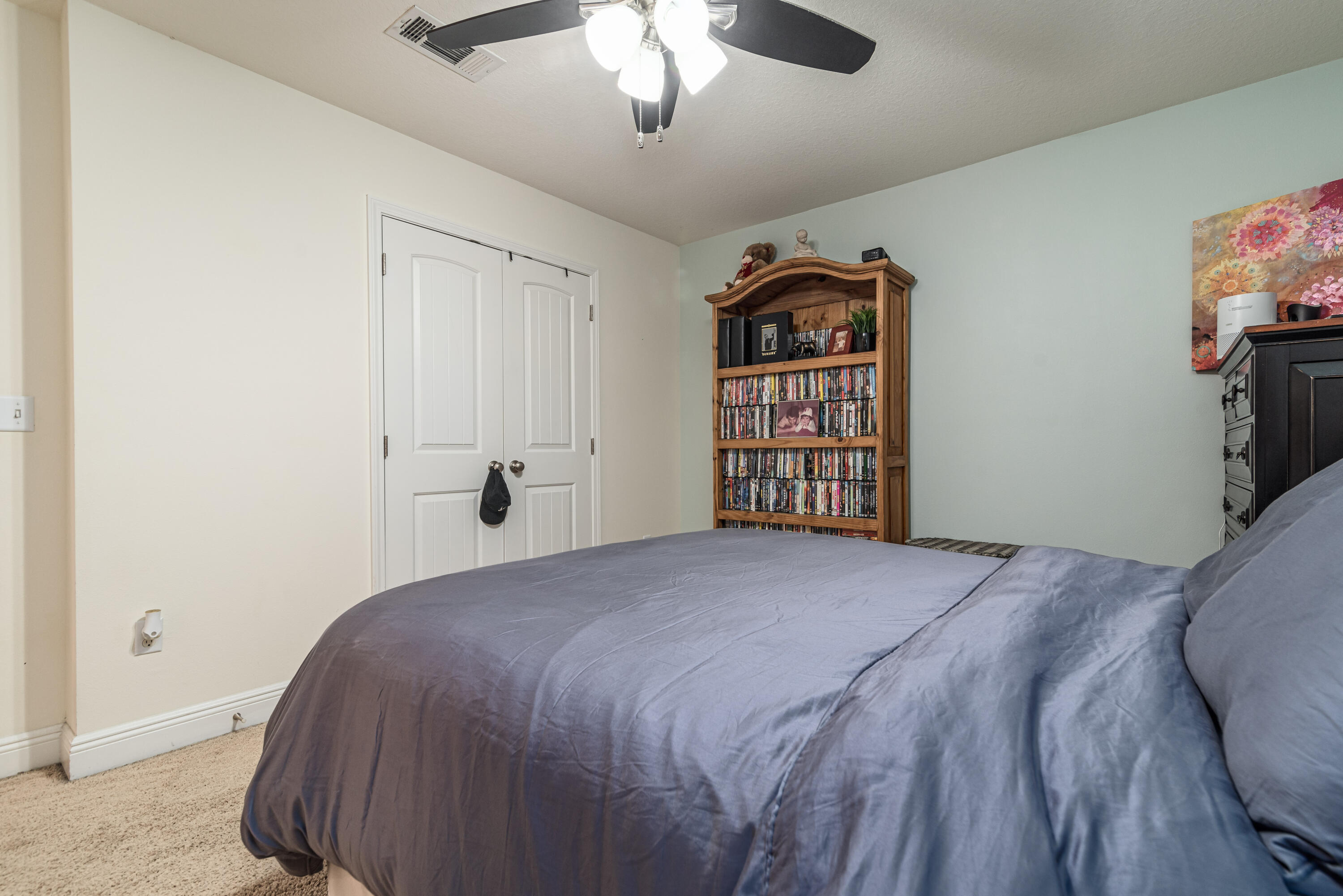 142 Pin Oak Loop Santa Rosa Beach, FL 32459 - Photo 46 of 56 a bedroom with a bed and a chandelier