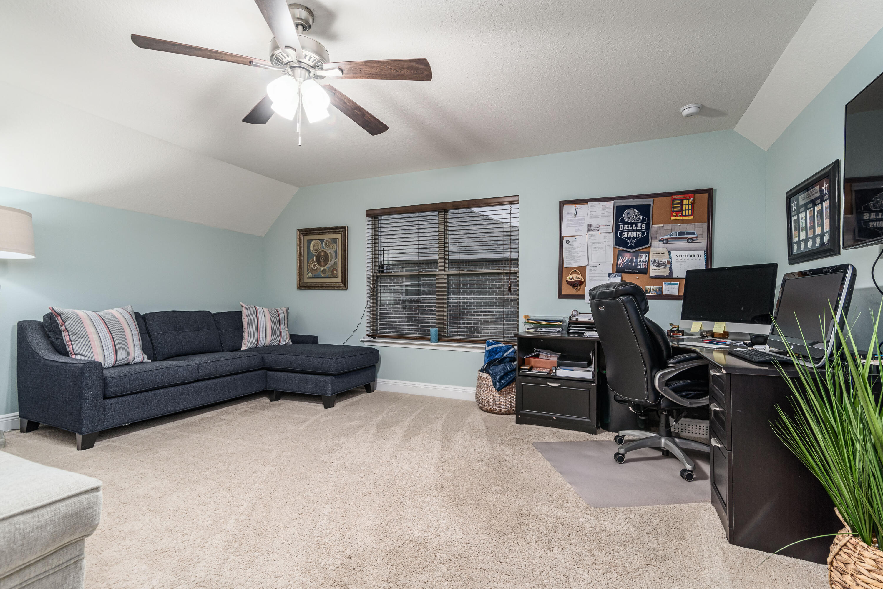 142 Pin Oak Loop Santa Rosa Beach, FL 32459 - Photo 54 of 56 a livingroom with workspace and a couch