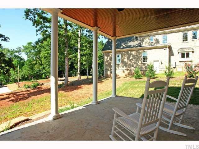 7919 Longleaf Branch Court Raleigh, NC 27612 - Photo 12 of 12 Covered Rocking chair porch