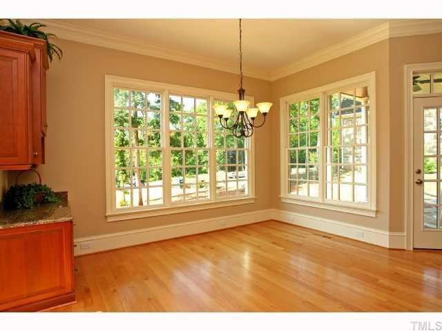 7919 Longleaf Branch Court Raleigh, NC 27612 - Photo 6 of 12 Breakfast room leading to covered porch