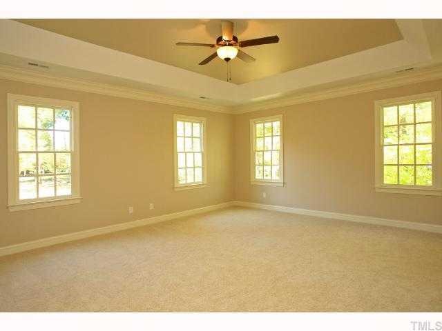 7919 Longleaf Branch Court Raleigh, NC 27612 - Photo 8 of 12 Master bedroom with tray ceiling