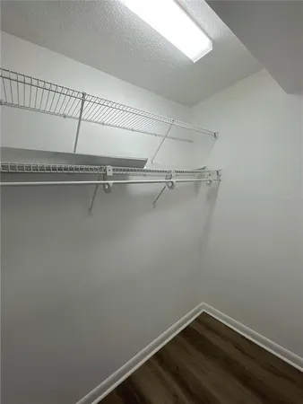 a view of a room with racks on the wall