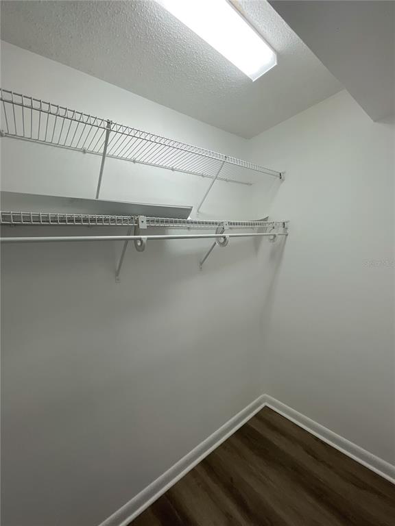 501 Southwest 75th Street, Unit C4 Gainesville, FL 32607 - Photo 30 of 37 a view of a room with racks on the wall