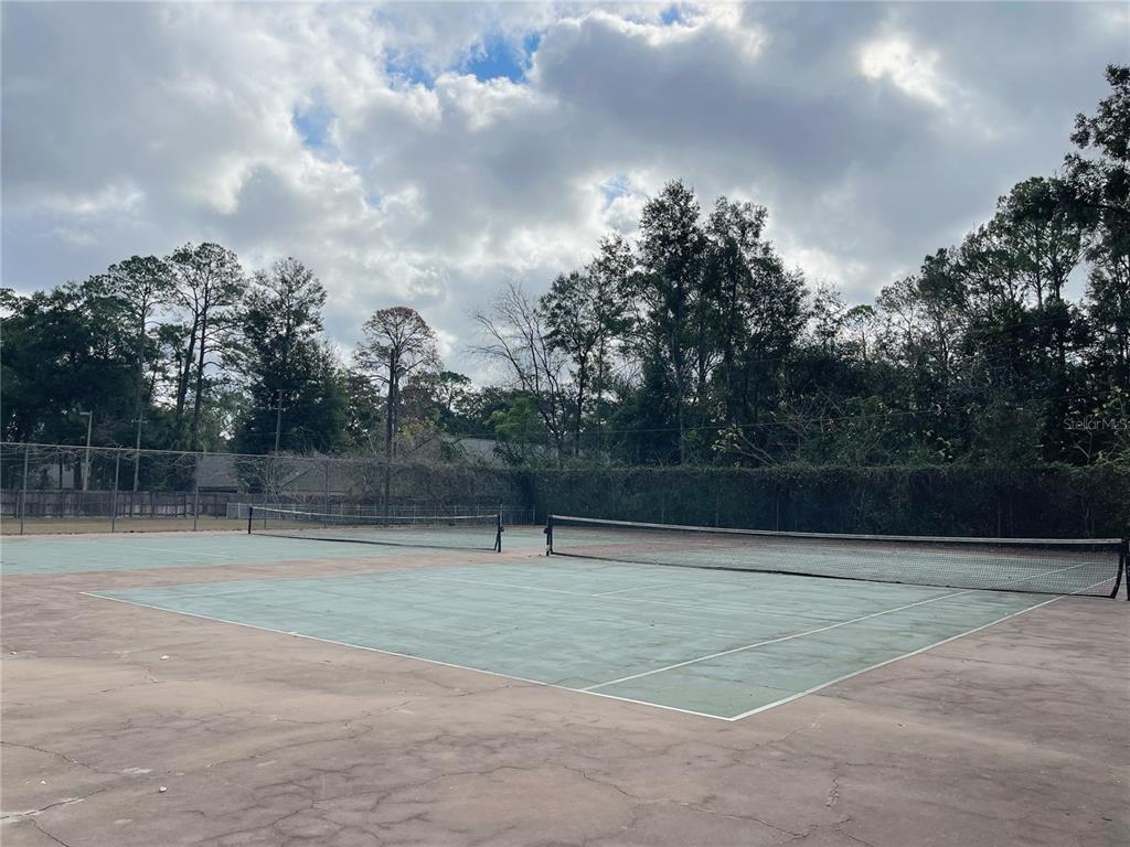 501 Southwest 75th Street, Unit C4 Gainesville, FL 32607 - Photo 35 of 37 a view of a tennis court