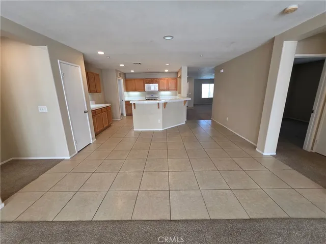 a view of a kitchen with a sink
