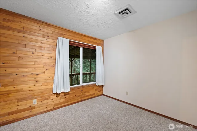 a view of a backyard of a house