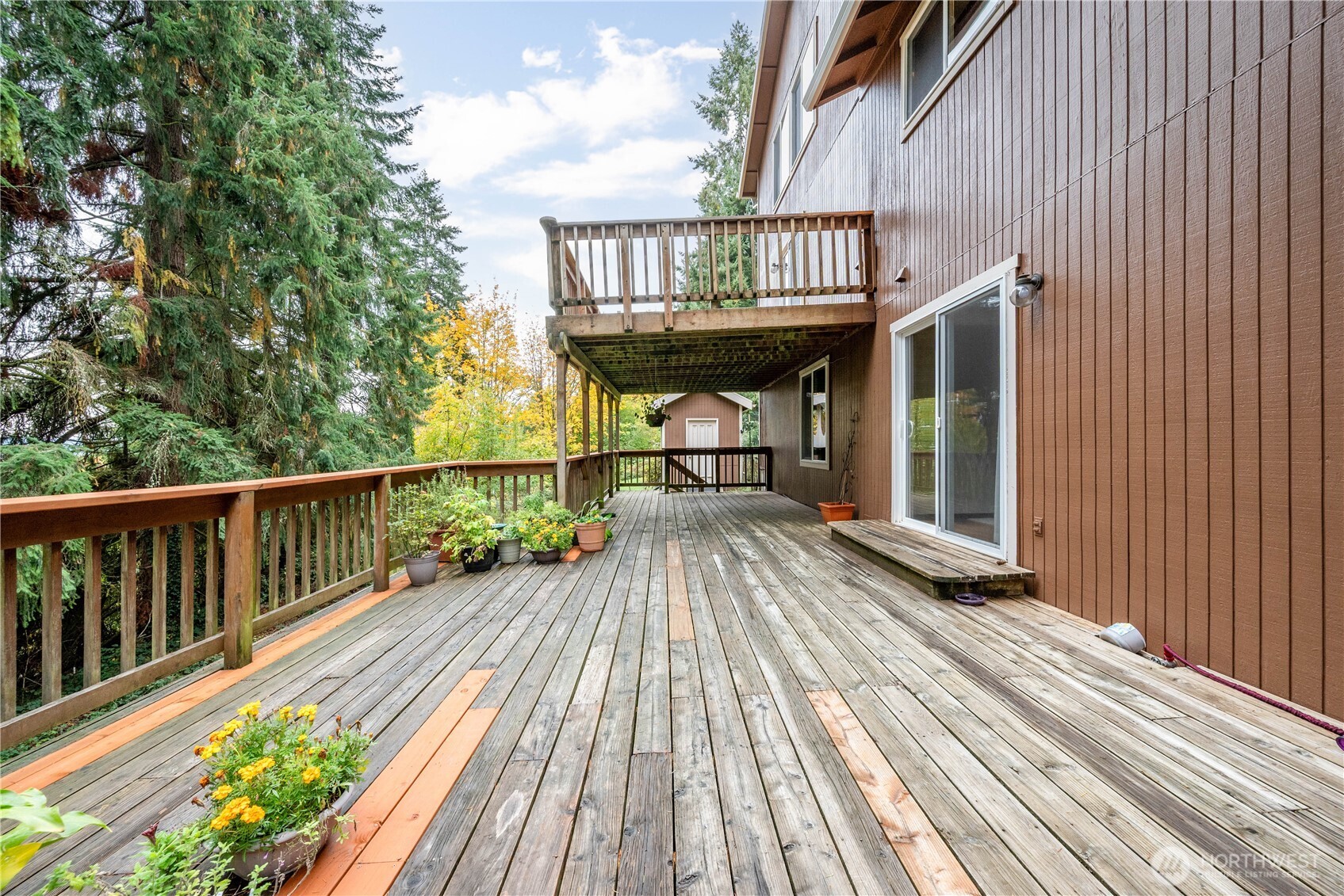 4415 Poplar Way Longview, WA 98632 - Photo 27 of 35 a view of a wooden deck with a yard