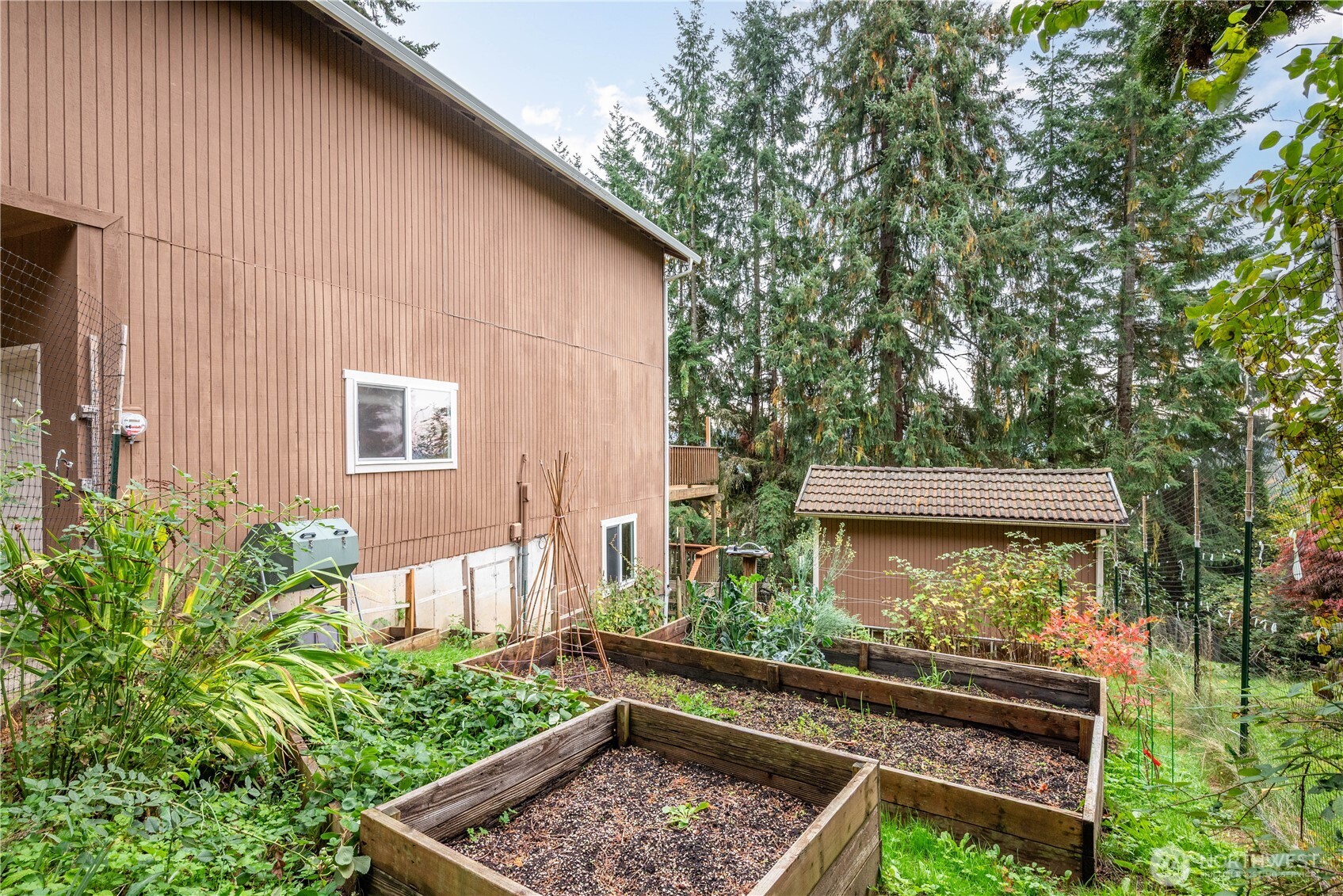 4415 Poplar Way Longview, WA 98632 - Photo 29 of 35 a view of a small pool with a bench in front of it