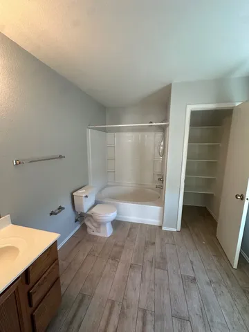 a bathroom with a sink and a toilet