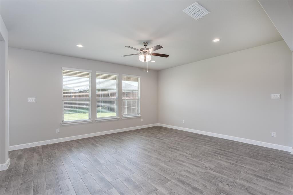 14621 Bootes Drive Haslet, TX 76052 - Photo 23 of 40 Spare room with light wood-style flooring, recessed lighting, and ceiling fan