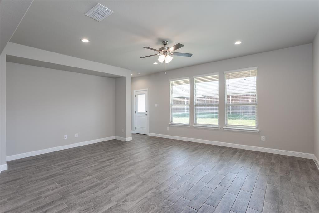 14621 Bootes Drive Haslet, TX 76052 - Photo 25 of 40 Empty room with light wood-style floors, a ceiling fan, and recessed lighting
