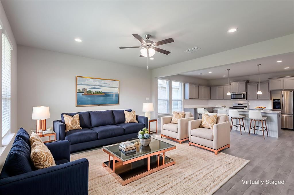 14621 Bootes Drive Haslet, TX 76052 - Photo 27 of 40 Living area with recessed lighting, light wood-style floors, and ceiling fan