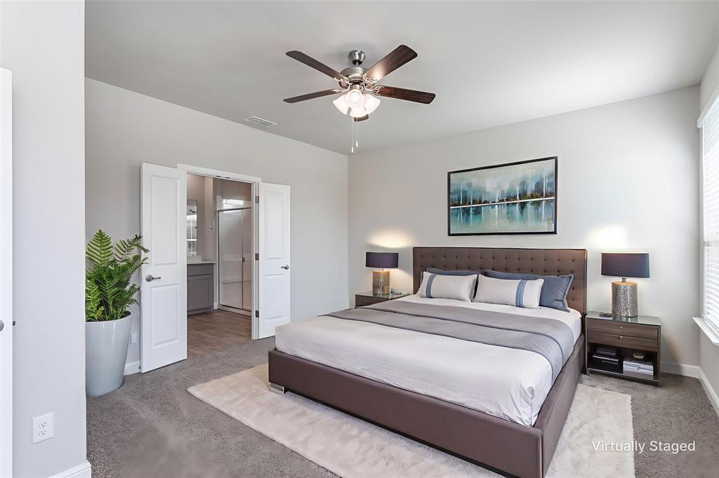 14621 Bootes Drive Haslet, TX 76052 - Photo 28 of 40 Carpeted bedroom with connected bathroom and ceiling fan