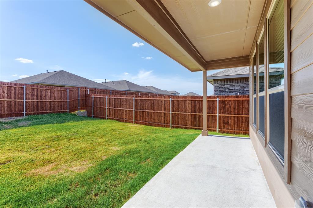 14621 Bootes Drive Haslet, TX 76052 - Photo 33 of 40 Fenced backyard with a patio