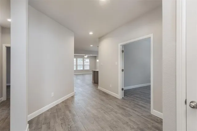 a bedroom with bed and a window