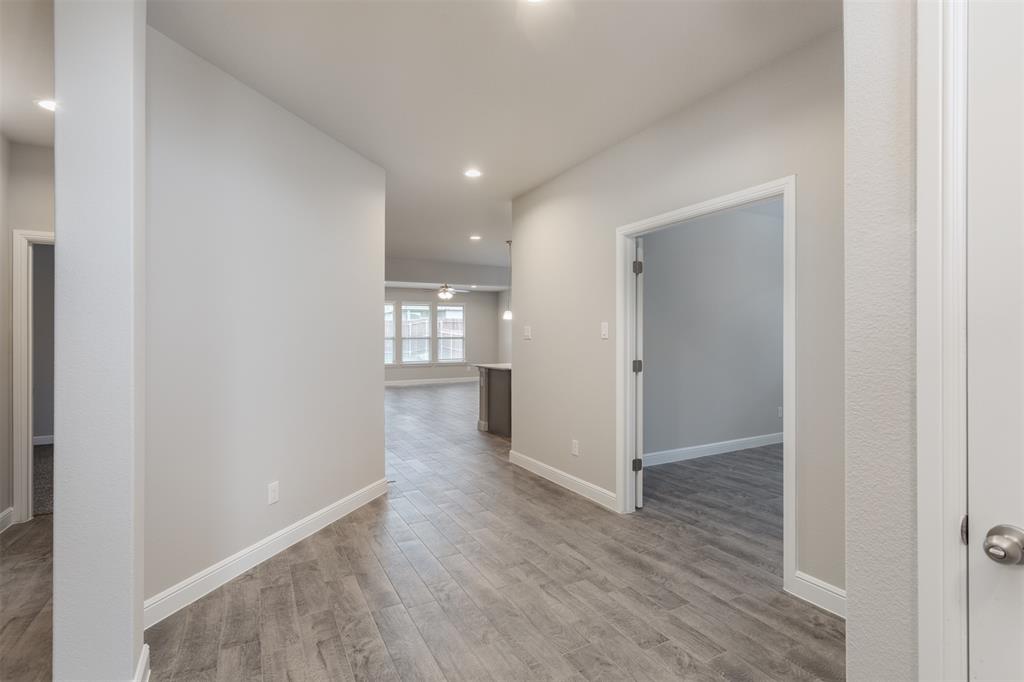 14621 Bootes Drive Haslet, TX 76052 - Photo 4 of 40 Corridor featuring light wood finished floors and recessed lighting