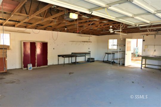 400 South Guam Street Ridgecrest, CA 93555 - Photo 34 of 39 a view of a room with wooden walls