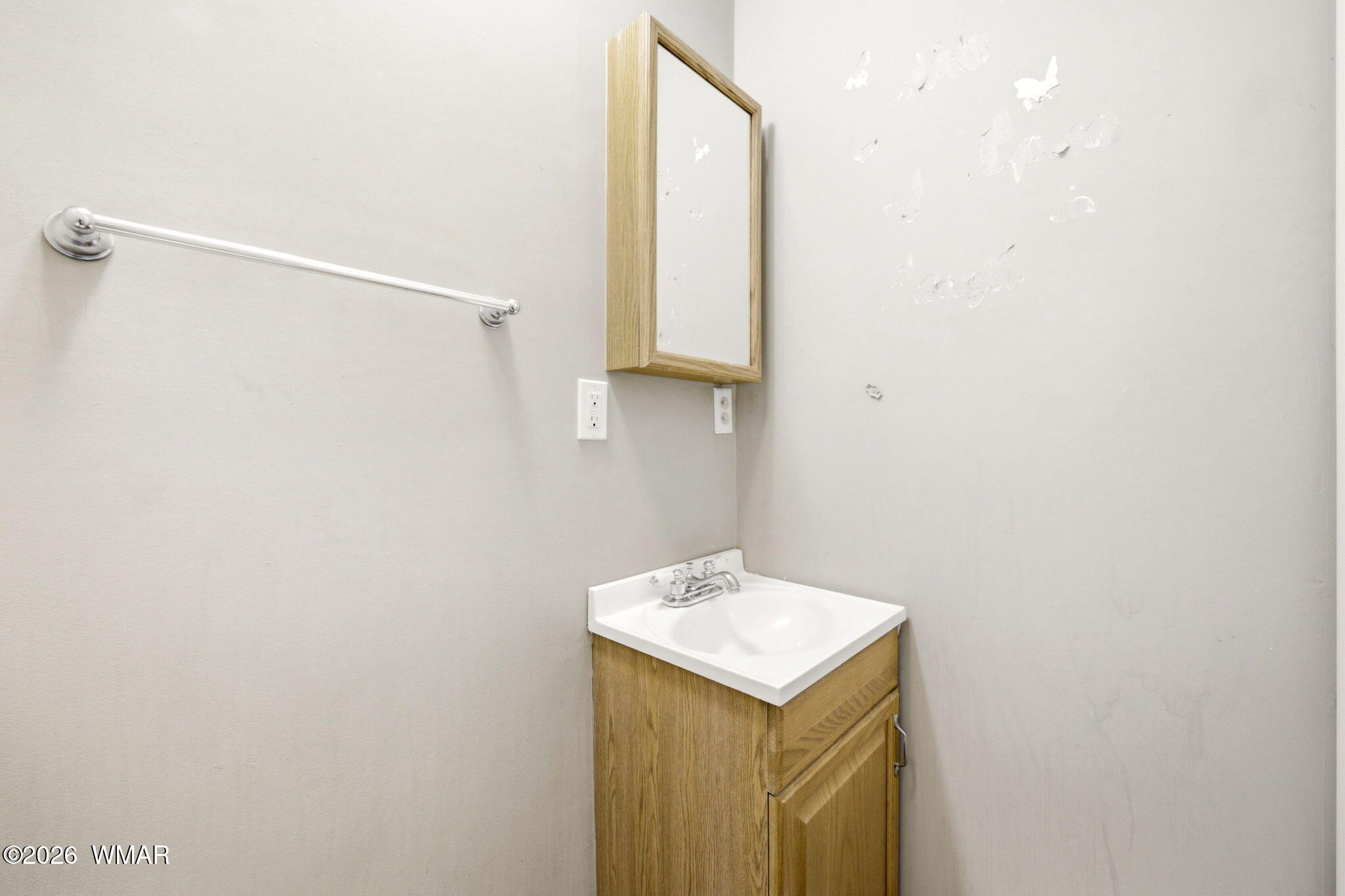 3650 Buckskin Road Overgaard, AZ 85933 - Photo 17 of 33 a bathroom with a sink and a mirror
