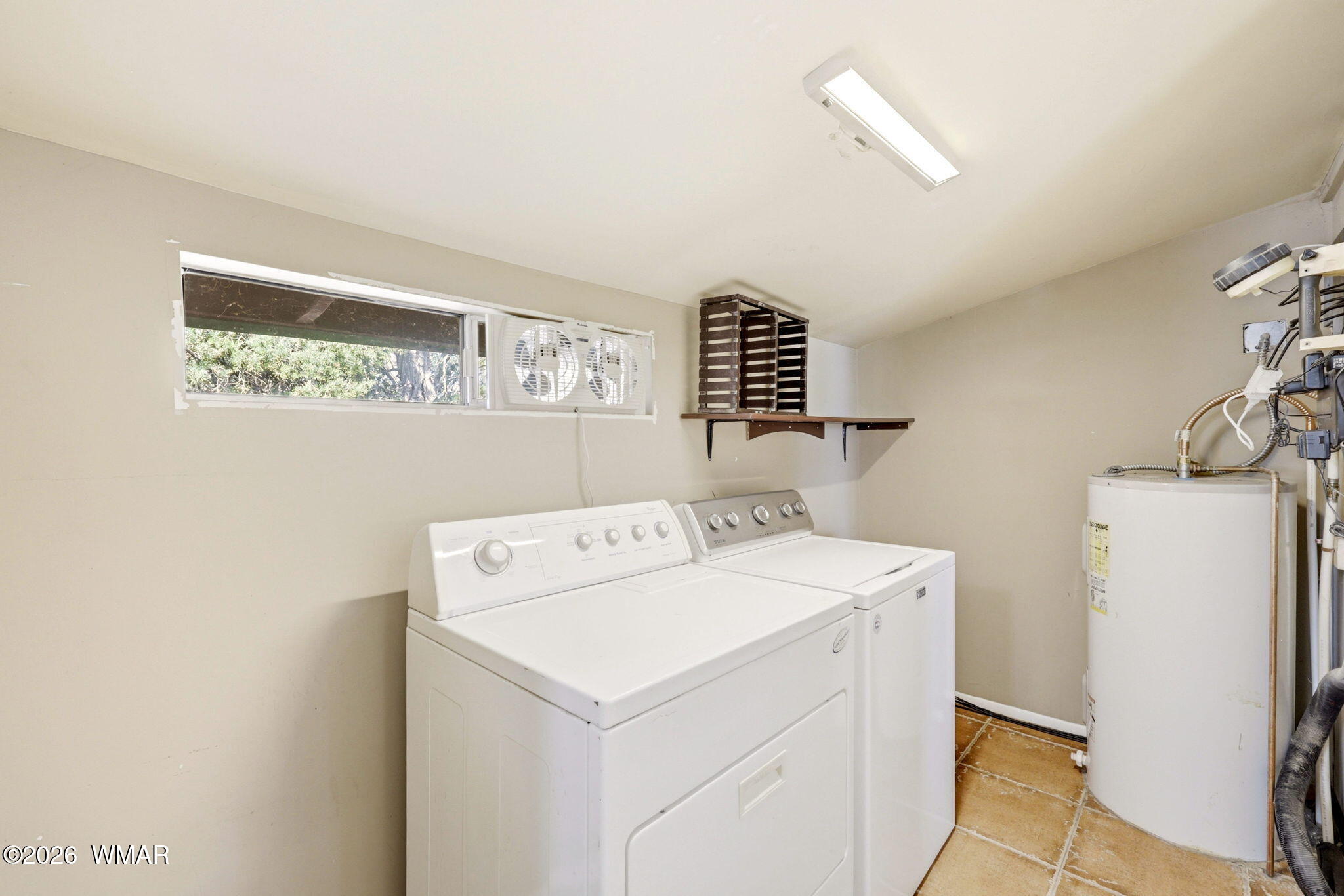 3650 Buckskin Road Overgaard, AZ 85933 - Photo 19 of 33 a utility room with dryer and washer