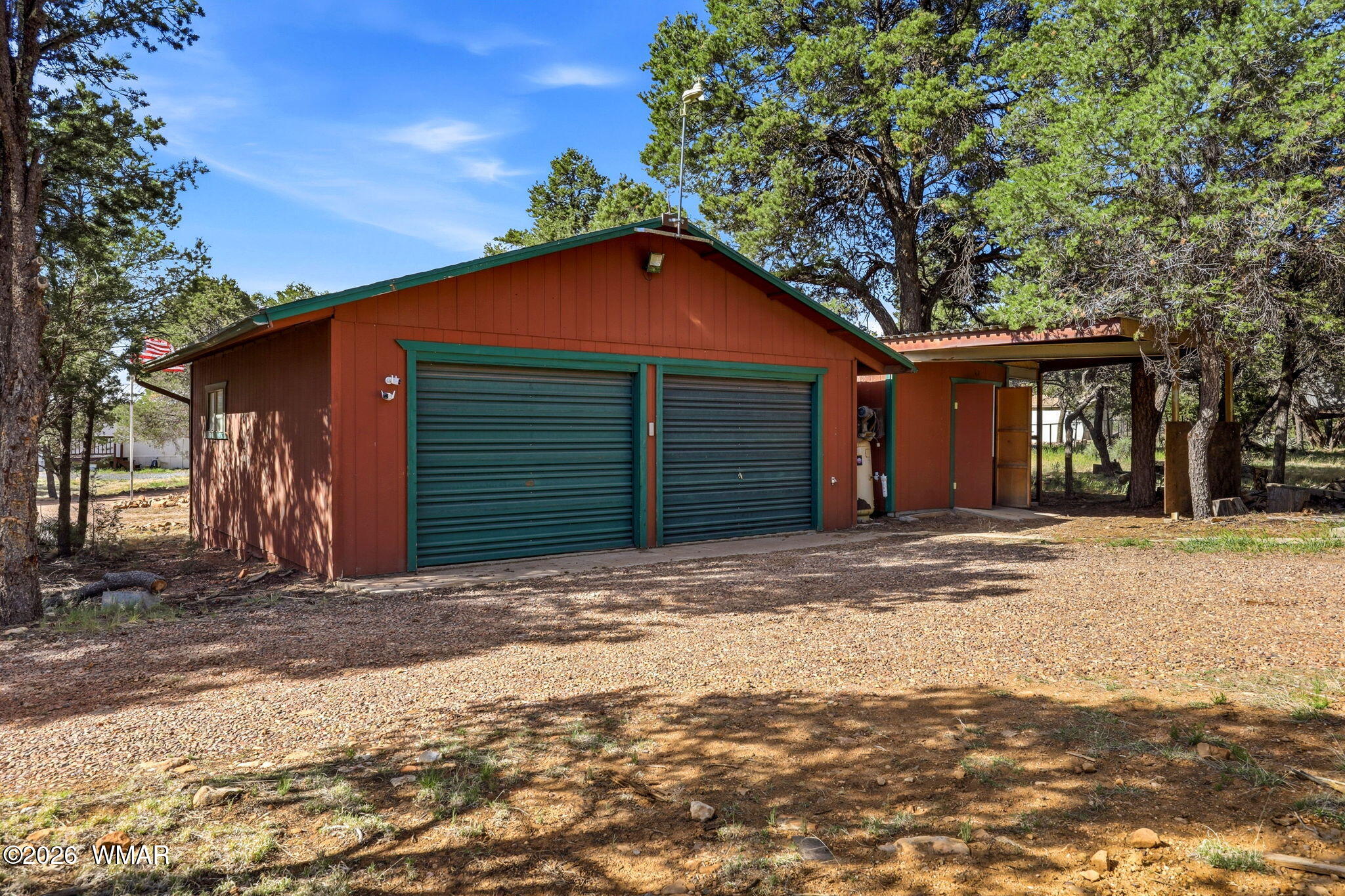 3650 Buckskin Road Overgaard, AZ 85933 - Photo 25 of 33 a front view of a house with a yard
