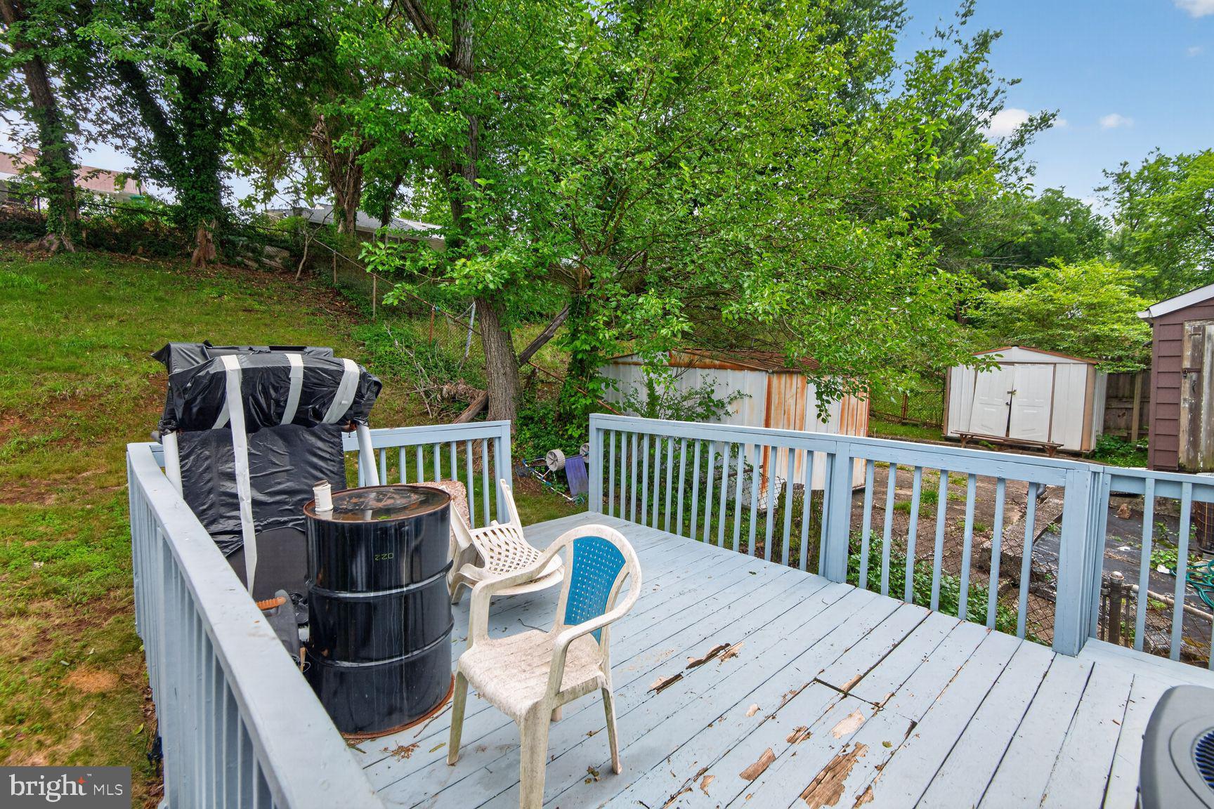 2015 Ray Leonard Road Landover, MD 20785 - Photo 13 of 15 Serene deck with lush greenery backdrop.