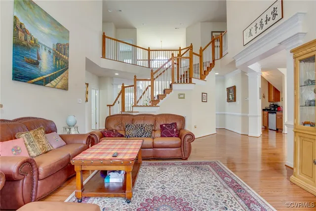 a living room with furniture and a rug