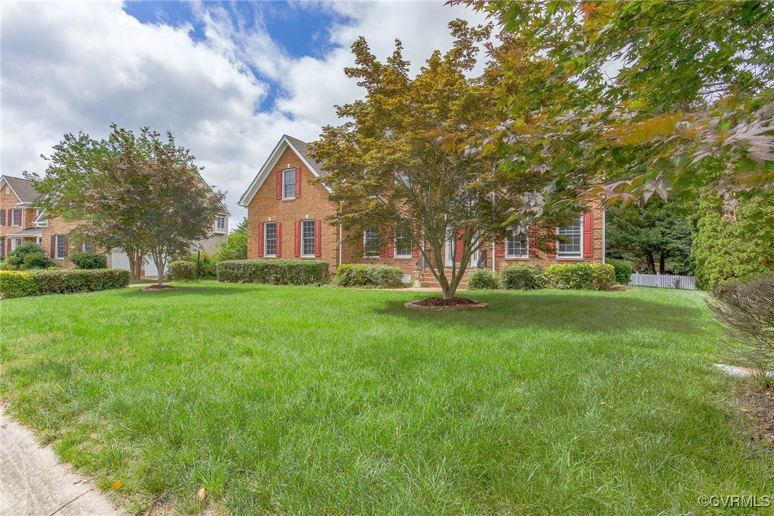 1306 Bach Terrace Midlothian, VA 23114 - Photo 2 of 50 a front view of house with yard and green space