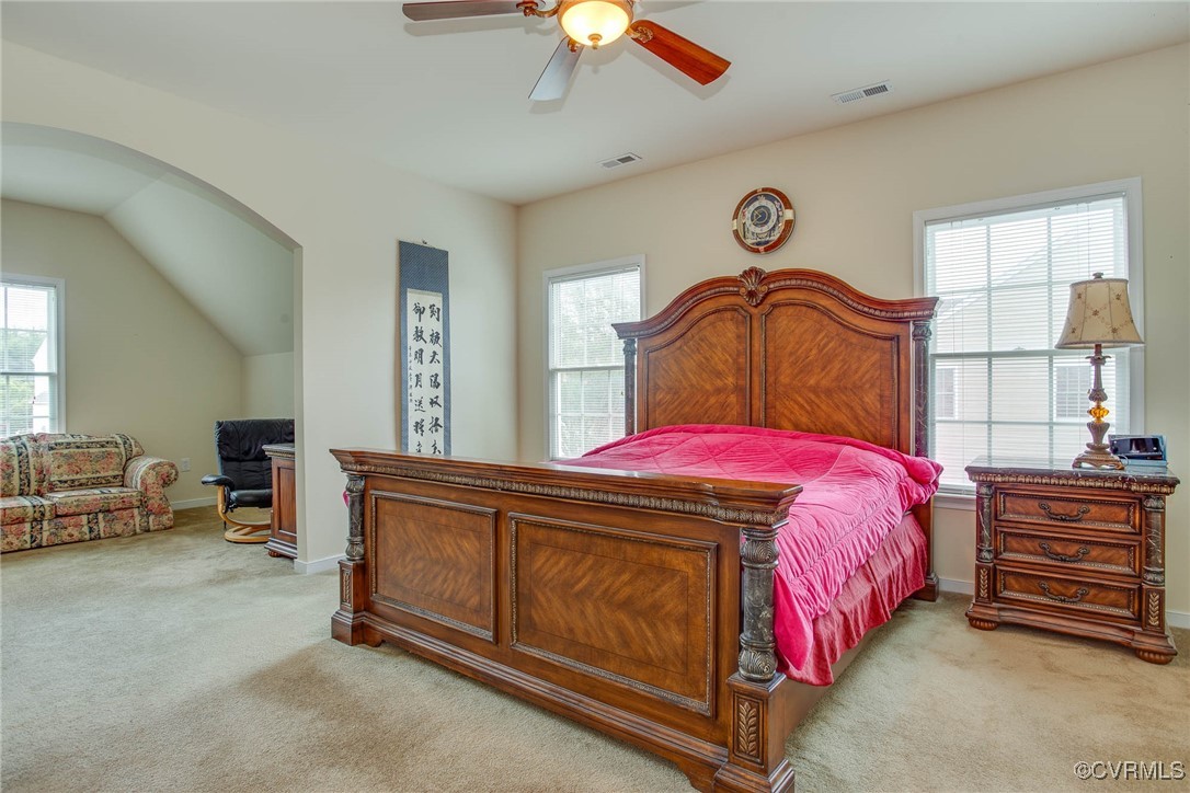 1306 Bach Terrace Midlothian, VA 23114 - Photo 21 of 50 a bedroom with a bed and a chandelier