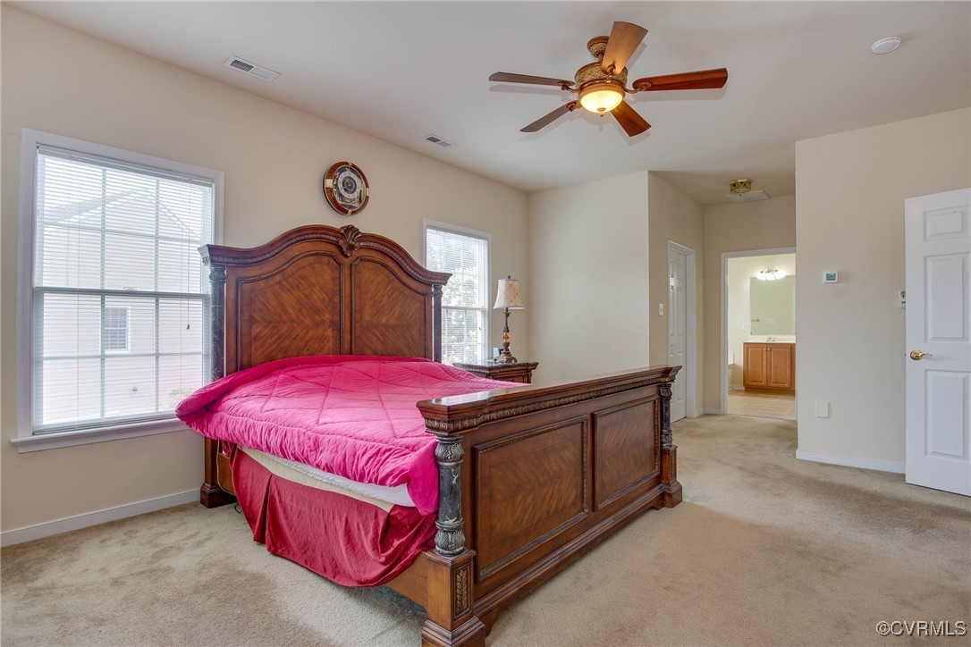 1306 Bach Terrace Midlothian, VA 23114 - Photo 22 of 50 a bedroom with a bed and a chandelier