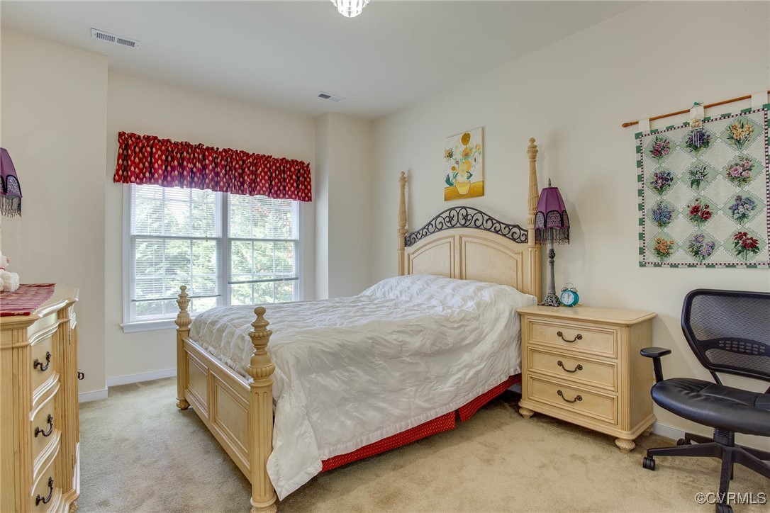1306 Bach Terrace Midlothian, VA 23114 - Photo 31 of 50 a bedroom with a bed and a window