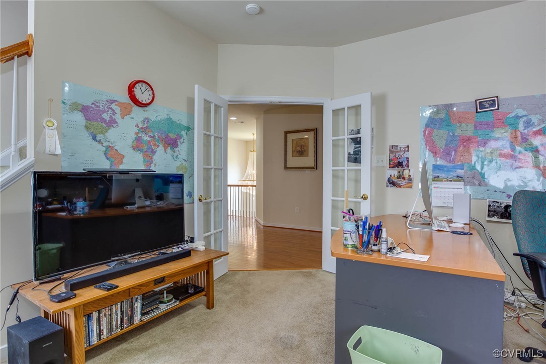 1306 Bach Terrace Midlothian, VA 23114 - Photo 35 of 50 a living room with furniture toys and a flat screen tv
