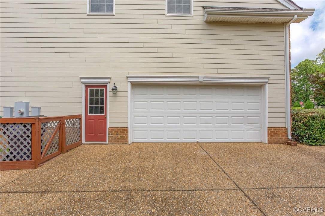 1306 Bach Terrace Midlothian, VA 23114 - Photo 40 of 50 a front view of a house with a garage
