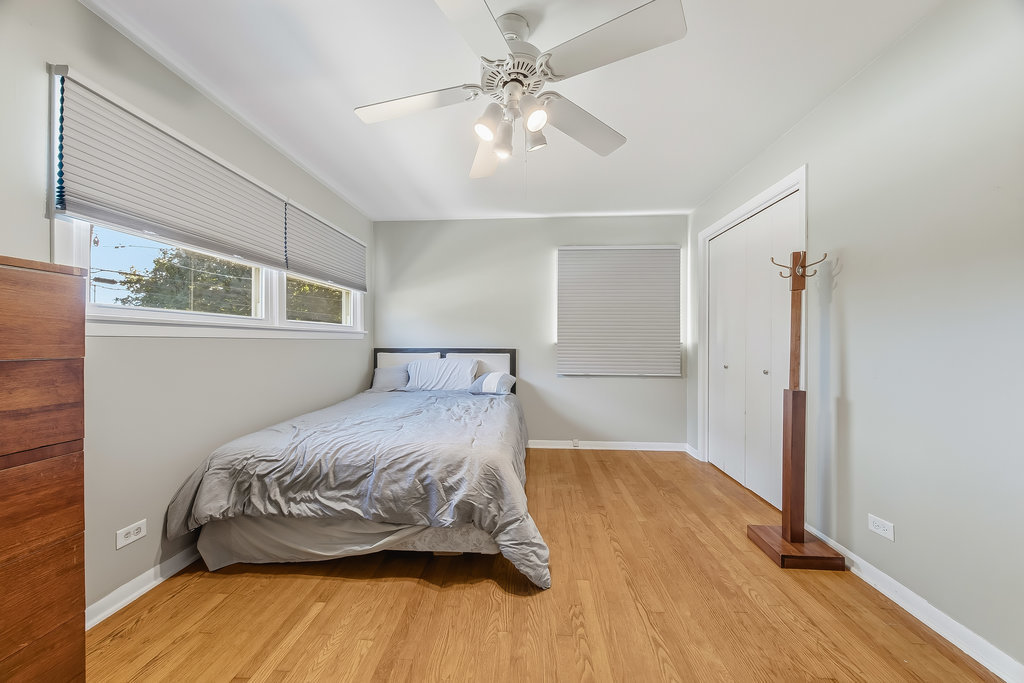 178 West Normandy Drive Chicago Heights, IL 60411 - Photo 12 of 19 a bedroom with a bed and a window