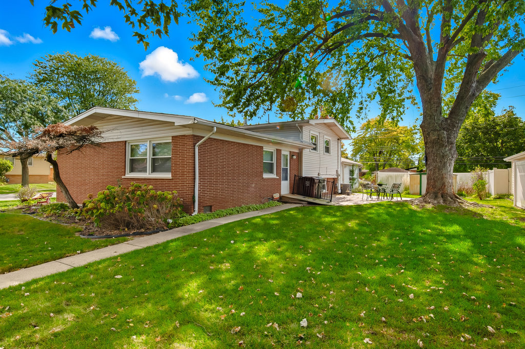 178 West Normandy Drive Chicago Heights, IL 60411 - Photo 19 of 19 a front view of house with yard and green space